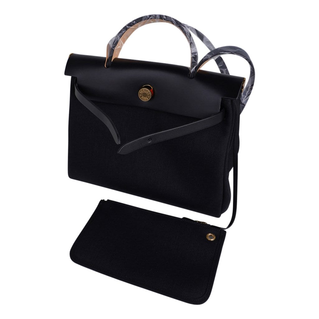A BLACK HUNTER LEATHER & CANVAS HERBAG ZIP 31 WITH GOLD HARDWARE, HERMÈS,  2019