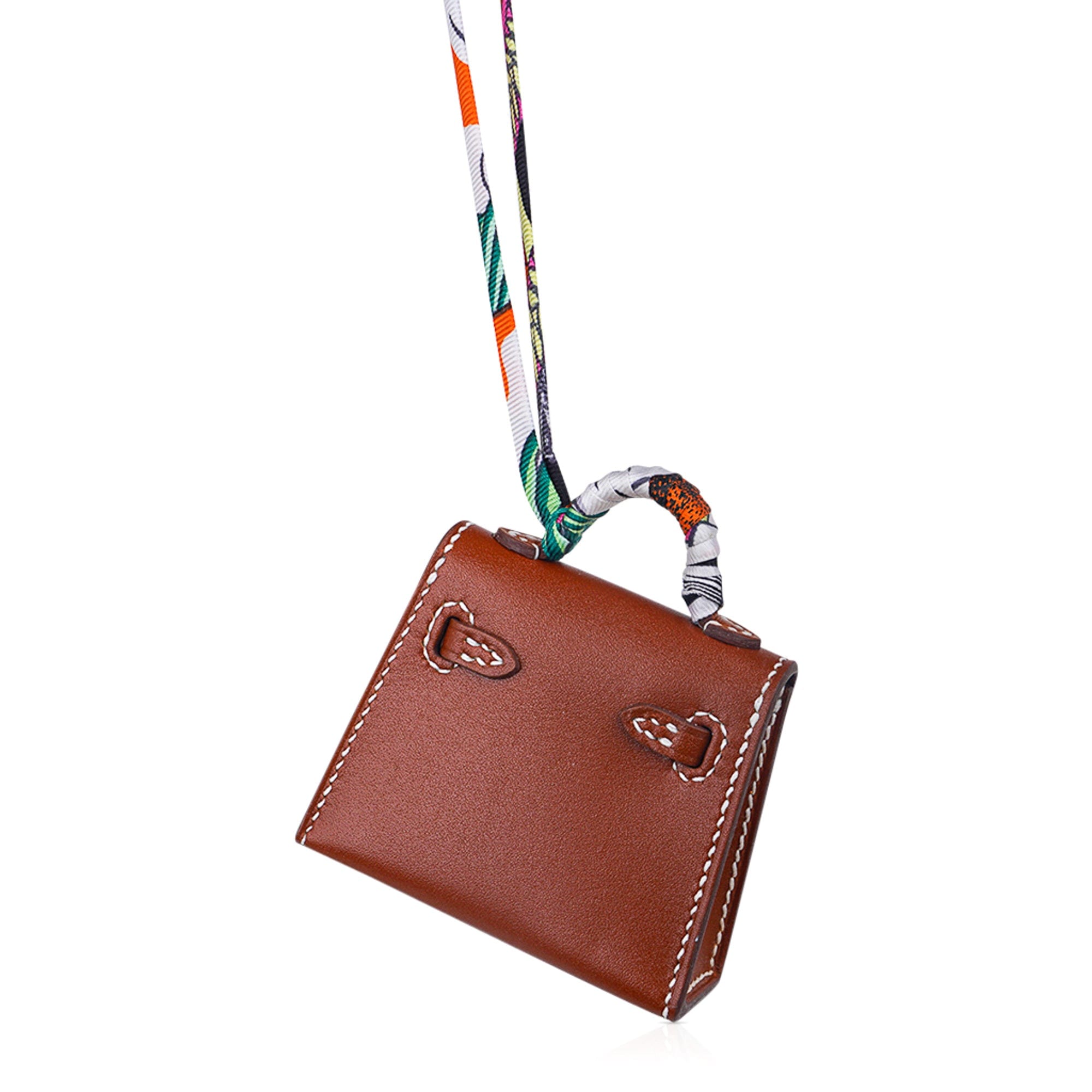 Hermes Bag Charms  Bag charm, Handbag charms, Leather craft
