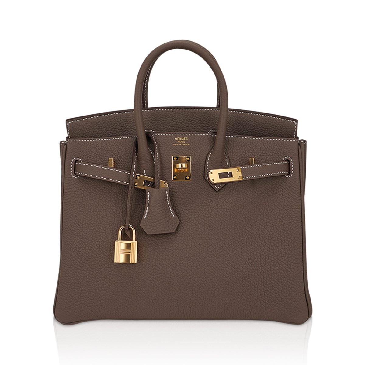 Carrying a Birkin 25 Etoupe Togo Ghw instantly elevates your style