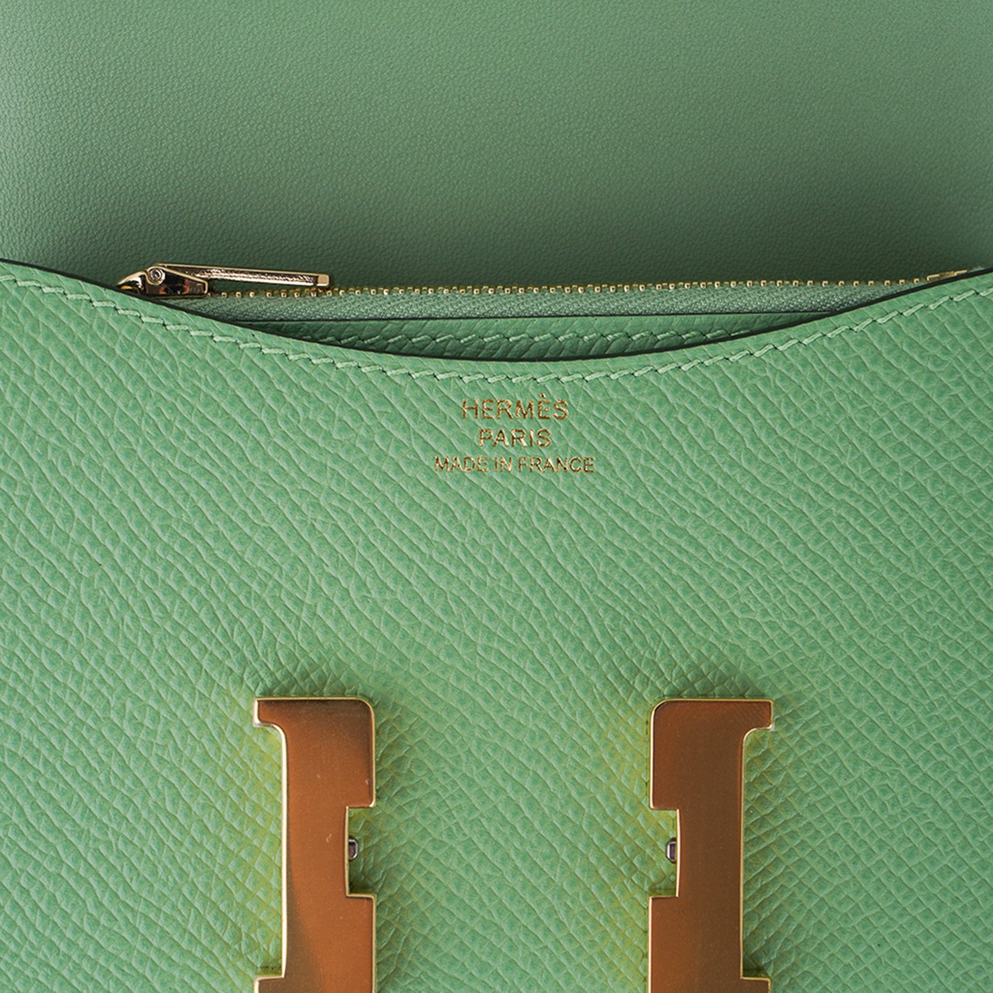 Vert de Gris Constance Slim wallet with gold hardware - HERMÈS