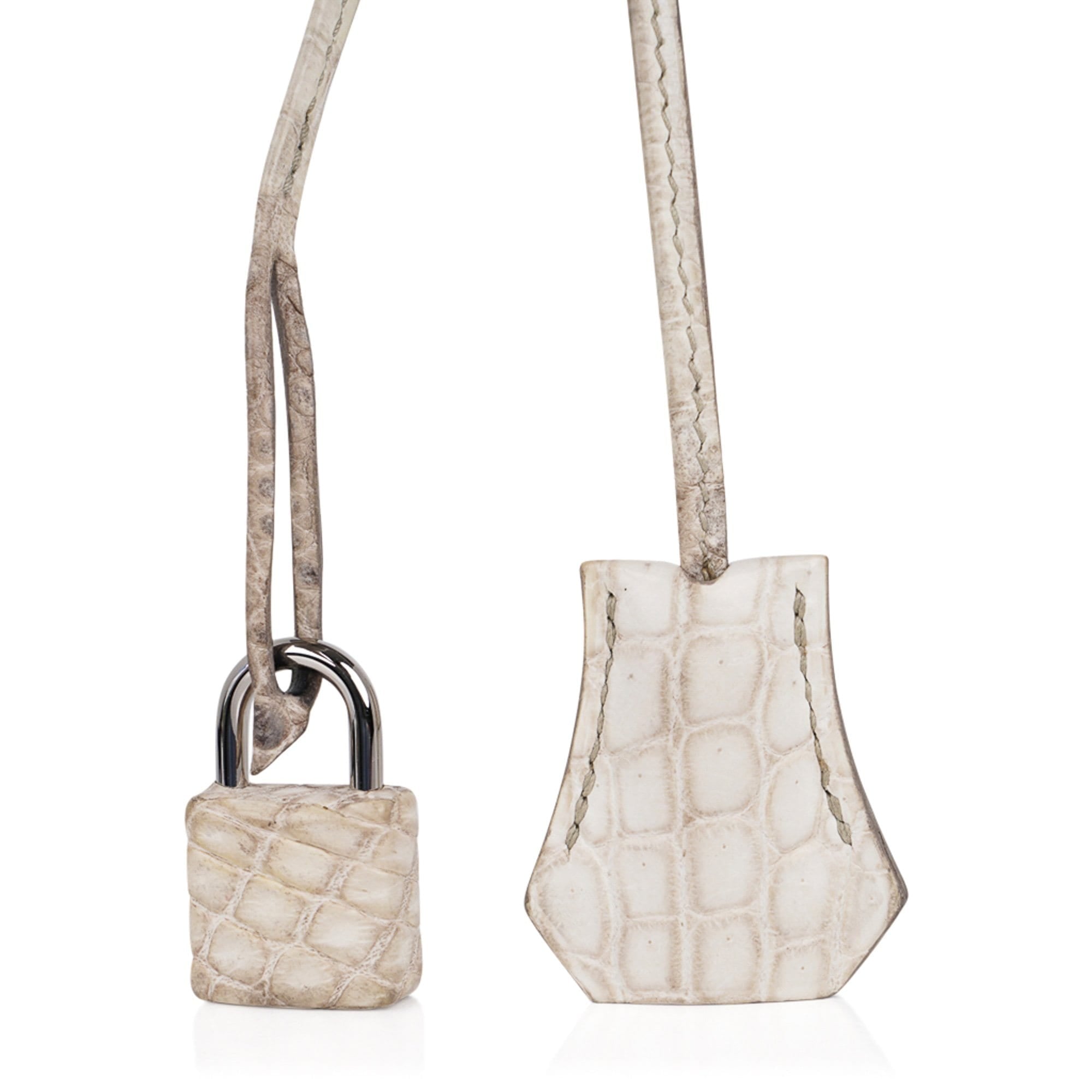 Exceptional and untraceable Hermès Kelly saddle bag handbag 32cm