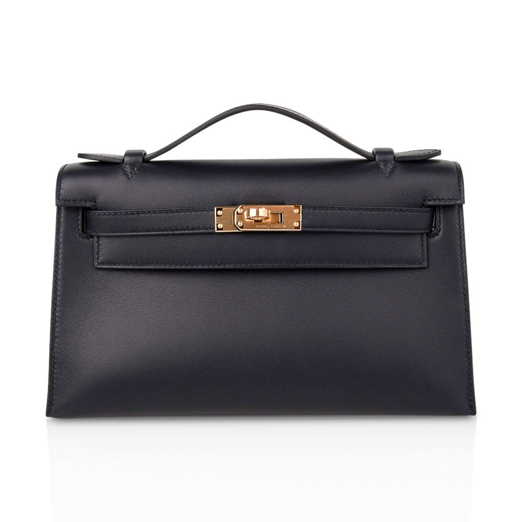Hermès Kelly Cut Clutch Bag In Black Swift Leather With Gold Hardware in  White