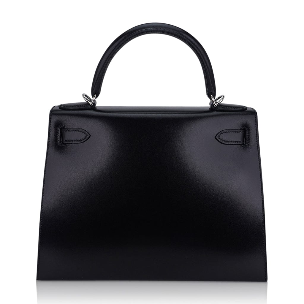 A LIMITED EDITION BLACK CALF BOX LEATHER SELLIER KELLY 28 WITH GUILLOCHÉ  PALLADIUM HARDWARE