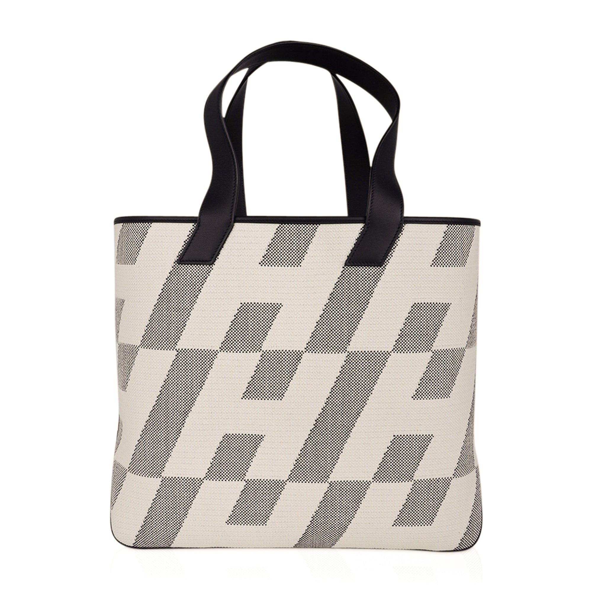 https://mightychic.com/wp-content/uploads/2023/12/hermes-cabas-h-en-biais-tote-for-sale-on-mightychic.jpg